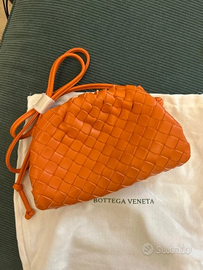 Borsa pochette in pelle intrecciata arancione