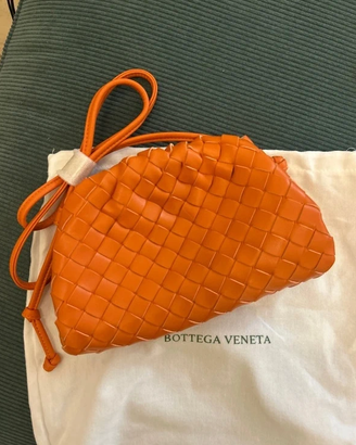 Borsa pochette in pelle intrecciata arancione