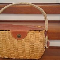 Borsa a bauletto in vimini intrecciato e cuoio