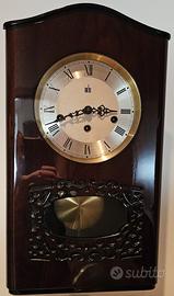 orologio da parete vintage Melux a pendolo