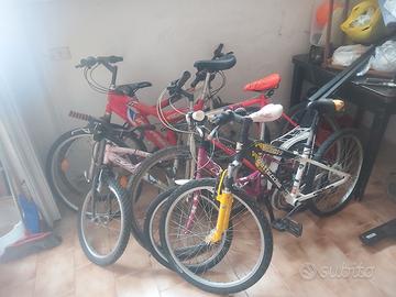 biciclette adulti e bambini in blocco 