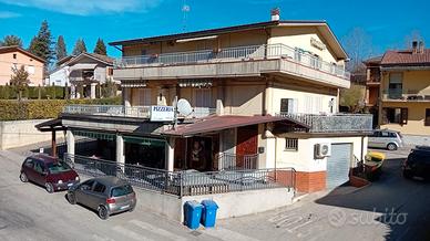 Edificio plurifamiliare-Locale commerciale