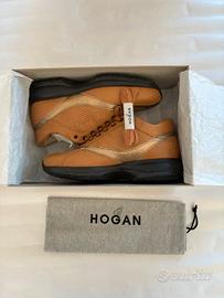 Sneakers Hogan in pelle marrone con dettagli oro -