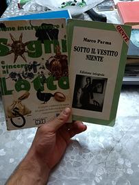 2 Libri usati, un romanzo e un libro a caso vicino