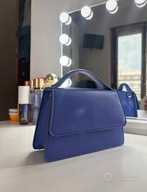 borsetta viola con tracolla