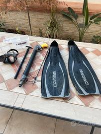 Maschera , fucile, pinne, tutto cresi