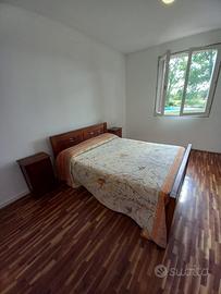 Letto matrimoniale e mobili stile etnico
