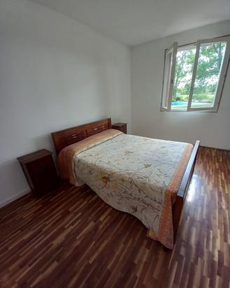 Letto matrimoniale e mobili stile etnico