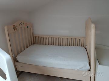 lettino per neonati con sbarre regolabili 