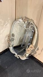 Specchio con cornice in ferro battuto