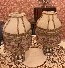 Coppia di lampade fiorentine in legno dorato