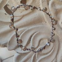 Braccialetto di filo e perline  trasparenti 