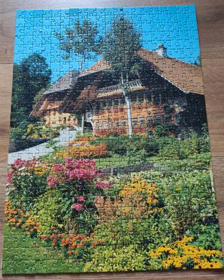 Puzzle quadro Villa con giardino fiorito