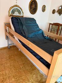 Letto con sponde motorizzato