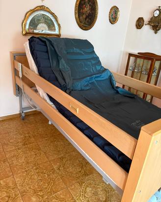 Letto con sponde motorizzato
