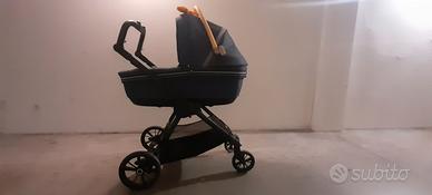 
Trio CAM - Passeggino, Navicella e Seggiolino Aut