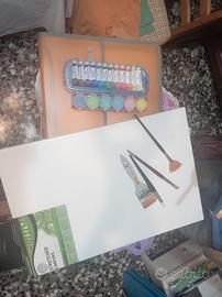 Vendeai tela, pennelli, colori cartella
