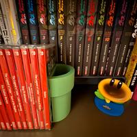 Supporto tubo Super Mario per giochi e libri