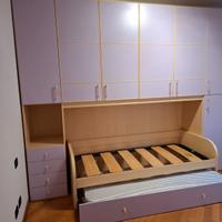 Armadio a ponte con due letti