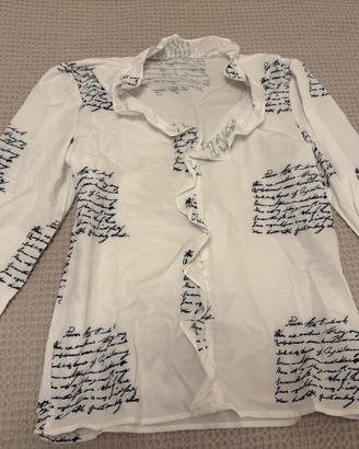 Blusa bianca con scritte