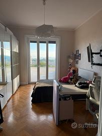 Camera con bagno condiviso
