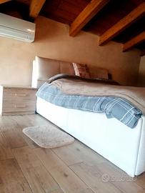 Letto matrimoniale contenitore testiera regolabile