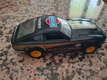 modellino Burago Datsun turbo