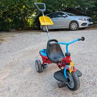 Triciclo con sedile regolabile