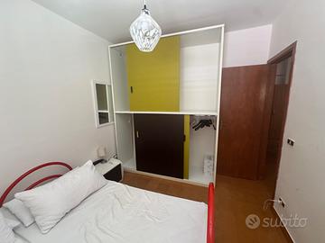 Armadio con ante scorrevoli + letto matrimoniale