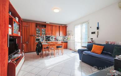 BILOCALE CON TERRAZZO E POSTO AUTO