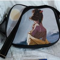 Borsa con tracolla regolabile