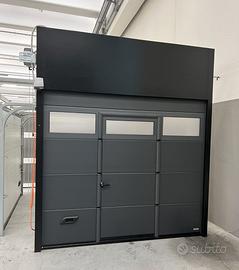 Portone sezionale RAL 7016 con porta 2500 x H 2000