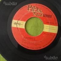 45 giri La Bambola-PattiPravo, Il Carrozzone-Renat