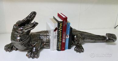 Grande portalibri di design. Ceramica, oro, marmo