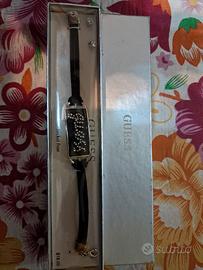 bracciale e orecchini Guess