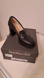 MOCASSINO CON TACCO