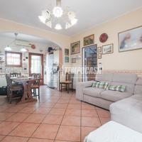 PORZIONE DI BIFAMILIARE CON GIARDINO PRIVATO