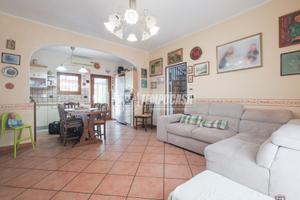 PORZIONE DI BIFAMILIARE CON GIARDINO PRIVATO