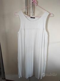 Abito bianco smanicato ed elegante