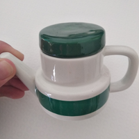 Porta oggetti a forma di bricchetto