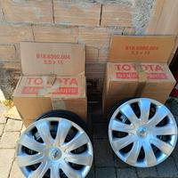 n 2 borchie Toyota + 2 cerchi 5,5 x 15 nuovi