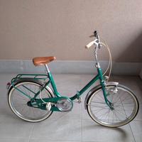 Bicicletta pieghevole verde vintage