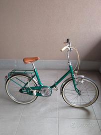 Bicicletta pieghevole verde vintage