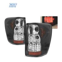 FANALI JEEP GRAND CHEROKEE 99-05 LED NERI