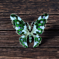 Spilla butterfly metallo dorato smaltata