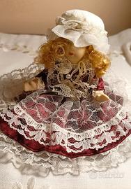 Bambolina di ceramica da collezione