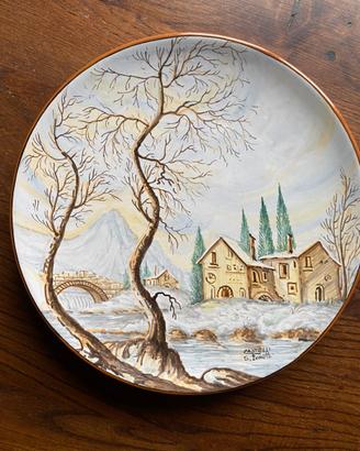 Piatto in ceramica decorato a mano