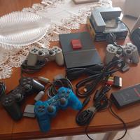 Playstation 2 con quattro controller e multi tap