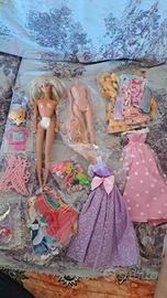 lotto vestiti e due barbie 