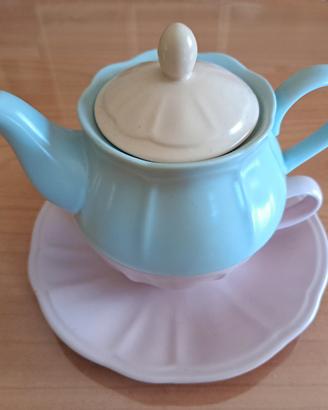 Set da tè con tazza e teiera.